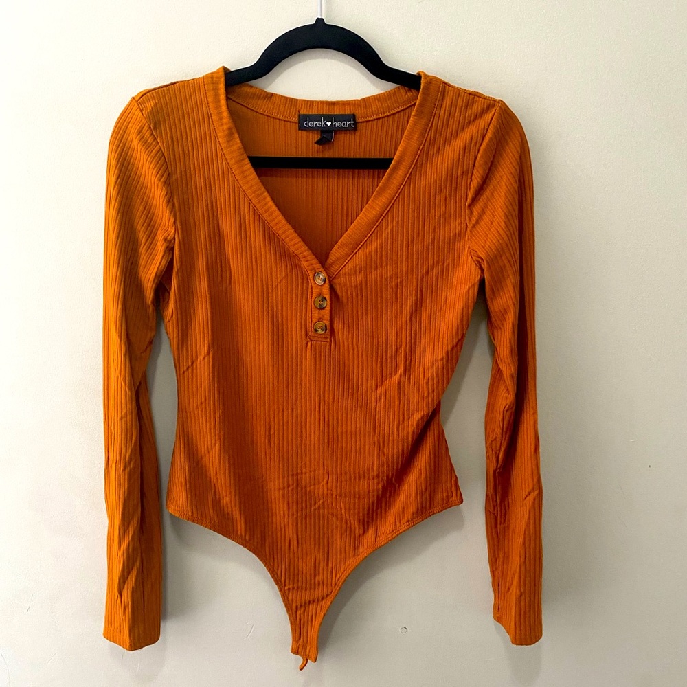Orange long sleeve bodysuit